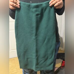 A green dress that is wrinkled since I don’t have an iron but never used